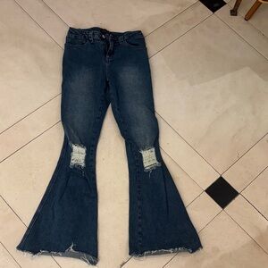 Delia’s Flared Blue Jeans with Distressed Details